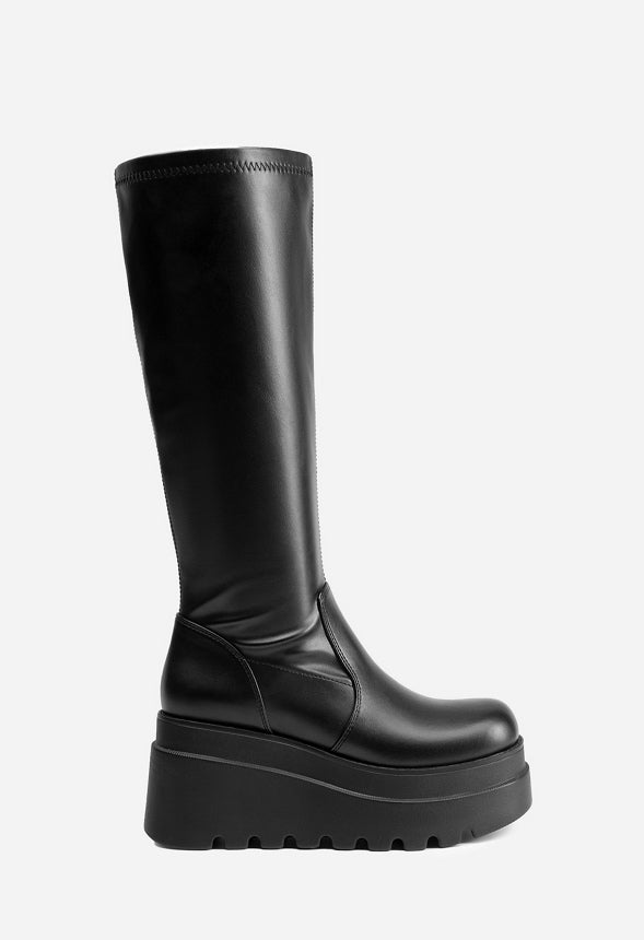 Botas hasta la rodilla con suela de tacos