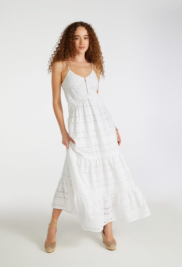 Vestido largo de volantes con ojales