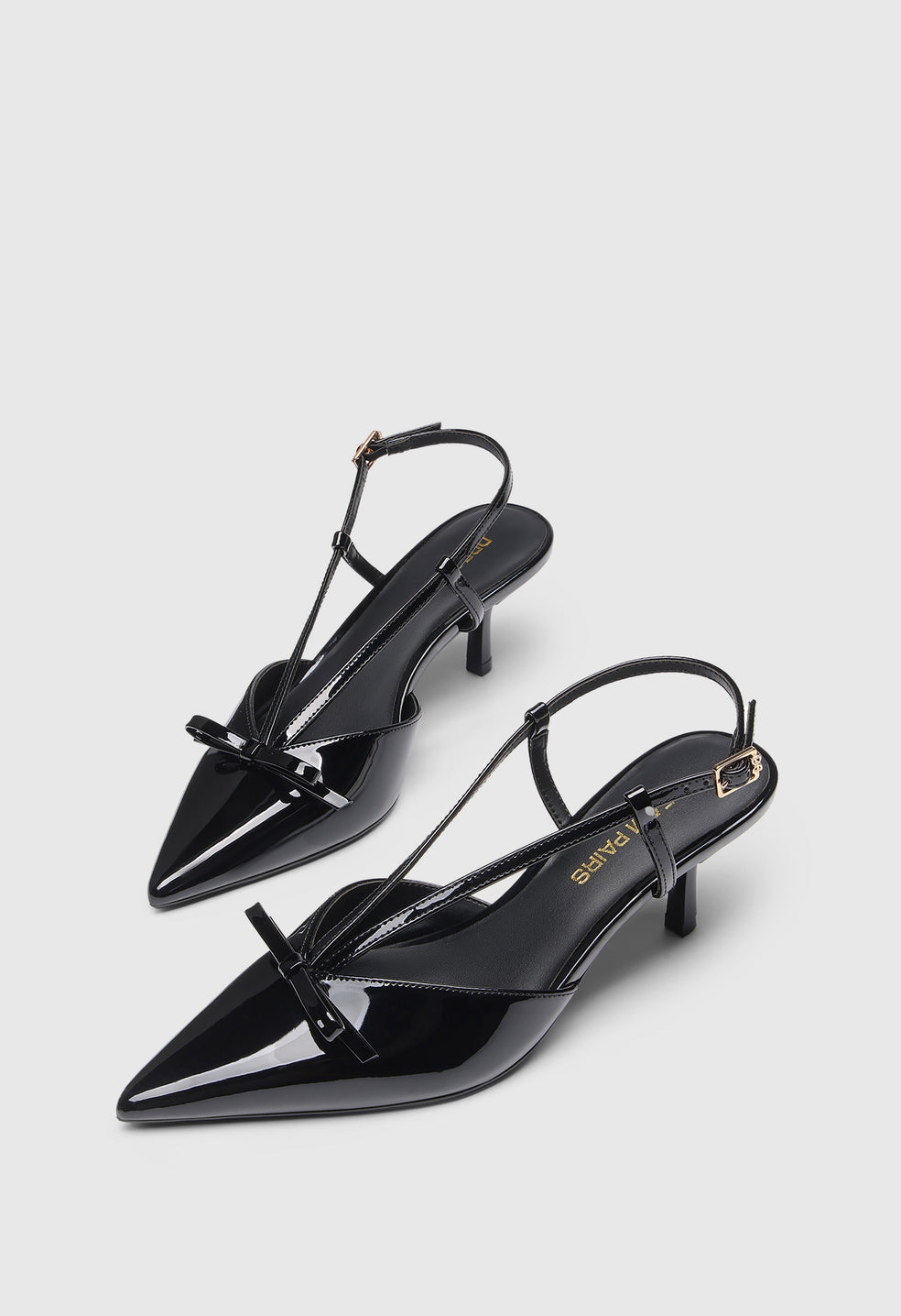 Zapatos destalonados elegantes de mujer